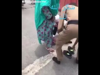 the police in makkah tore his clothes and gave them to the man